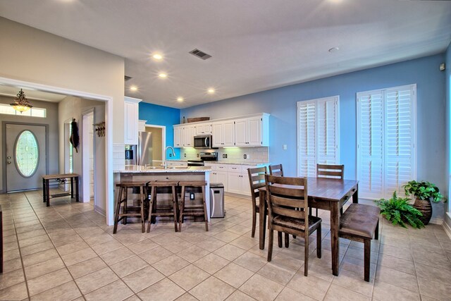 160 Somerset, Milam, TX 75959 - tiled dining space with sink