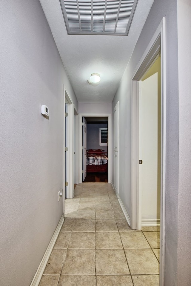 160 Somerset, Milam, TX 75959 - hallway with light tile patterned flooring