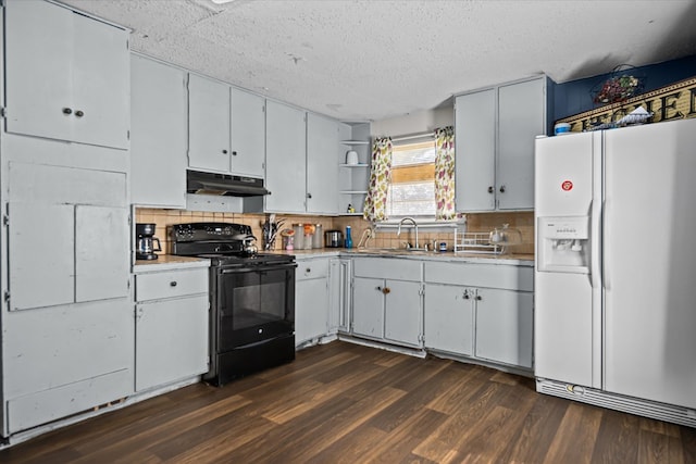 kitchen featuring white refrigerator with ice dispenser, light countertops, open shelves, black electric range, and under cabinet range hood