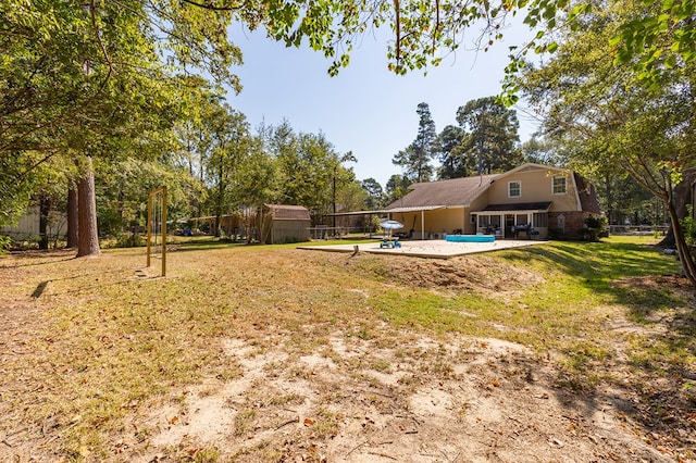 309 Hunters Creek Dr, Lufkin, TX 75901 - fenced backyard with a patio