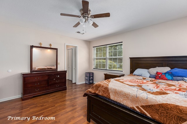 309 Hunters Creek Dr, Lufkin, TX 75901 - bedroom featuring dark wood finished floors, ceiling fan, and a closet