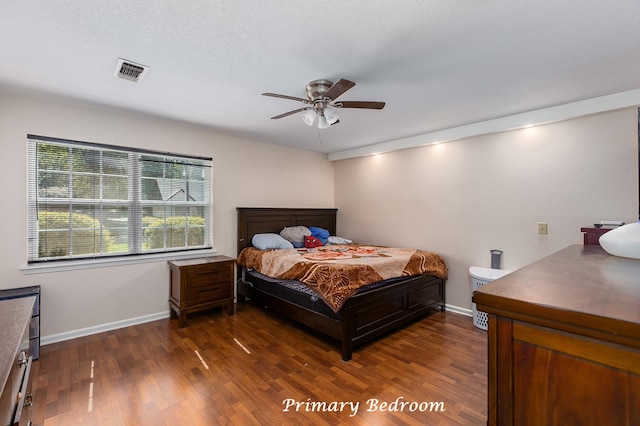 309 Hunters Creek Dr, Lufkin, TX 75901 - bedroom with dark wood finished floors and ceiling fan