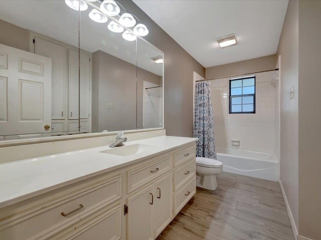 full bathroom featuring toilet, vanity, shower / bath combo, and hardwood / wood-style flooring