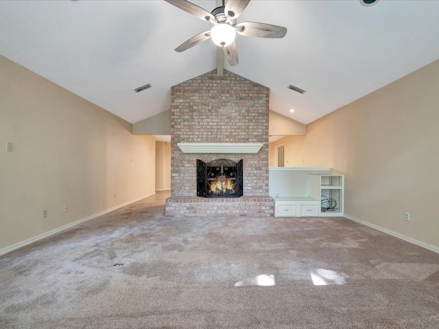 unfurnished living room with ceiling fan, a fireplace, carpet, and vaulted ceiling