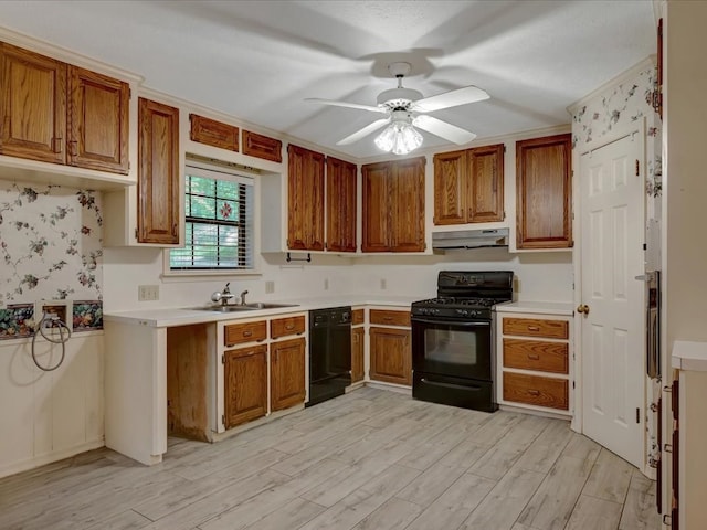 kitchen with ceiling fan, sink, black appliances, and light hardwood / wood-style floors