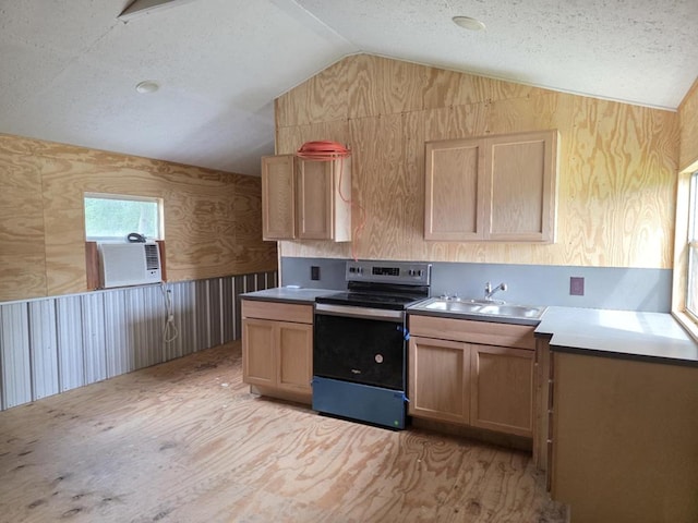 247 Fm 1645, Timpson, TX 75975 - kitchen with stainless steel electric stove, lofted ceiling, a sink, light brown cabinetry, and cooling unit