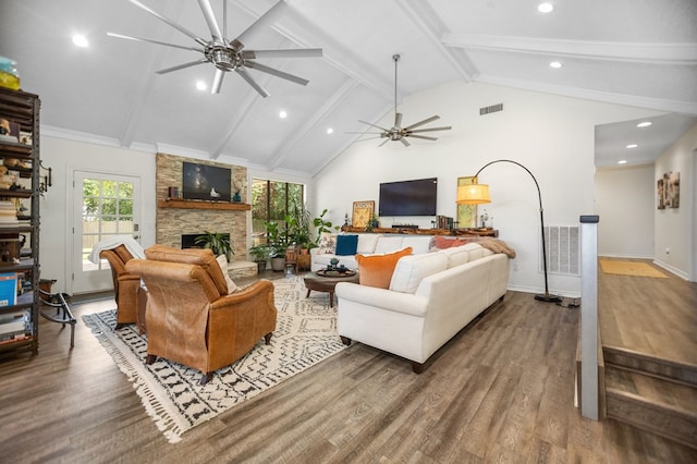 1405 Oak Hill Pl, Lufkin, TX 75904 - living room featuring a ceiling fan, wood finished floors, a fireplace, beamed ceiling, and recessed lighting