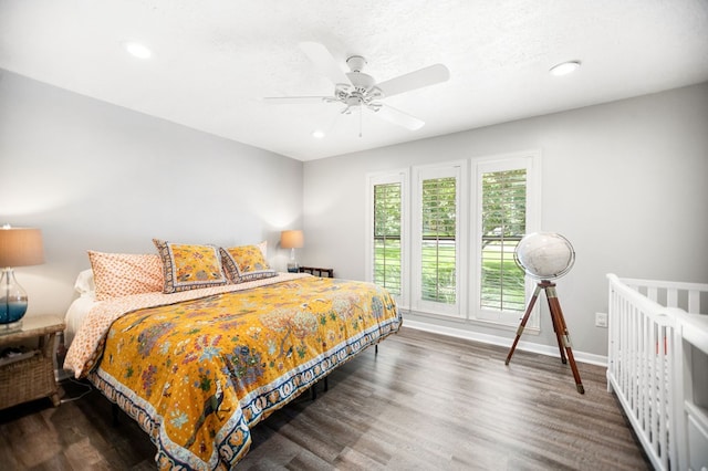 1405 Oak Hill Pl, Lufkin, TX 75904 - bedroom with wood finished floors, recessed lighting, and a ceiling fan