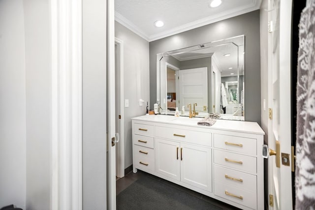 1405 Oak Hill Pl, Lufkin, TX 75904 - bathroom featuring vanity, recessed lighting, crown molding, and tile patterned flooring