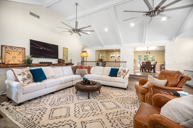 1405 Oak Hill Pl, Lufkin, TX 75904 - living room featuring ceiling fan, wood finished floors, beamed ceiling, high vaulted ceiling, and recessed lighting