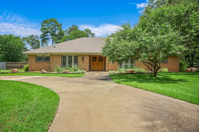 1405 Oak Hill Pl, Lufkin, TX 75904 - single story home featuring brick siding and a shingled roof