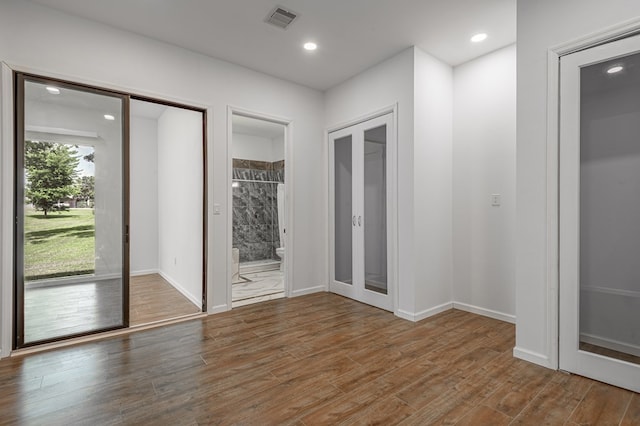 20 Coolcrest Dr, Point Blank, TX 77364 - unfurnished room featuring wood finished floors and recessed lighting