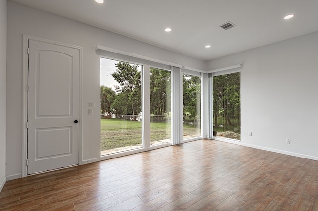 20 Coolcrest Dr, Point Blank, TX 77364 - spare room featuring wood finished floors and recessed lighting