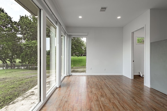 20 Coolcrest Dr, Point Blank, TX 77364 - spare room with wood finished floors and recessed lighting