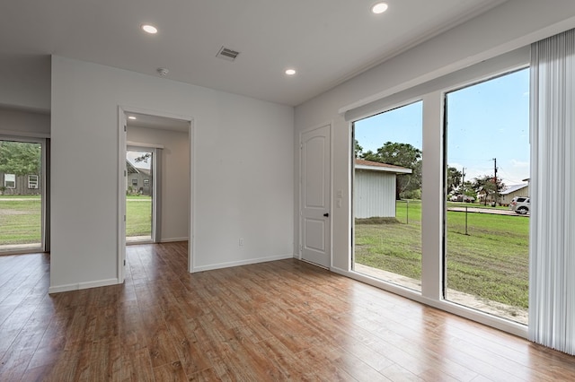 20 Coolcrest Dr, Point Blank, TX 77364 - spare room featuring plenty of natural light, hardwood / wood-style flooring, and recessed lighting