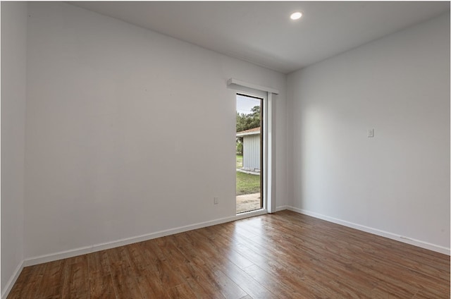 20 Coolcrest Dr, Point Blank, TX 77364 - empty room featuring wood finished floors and recessed lighting