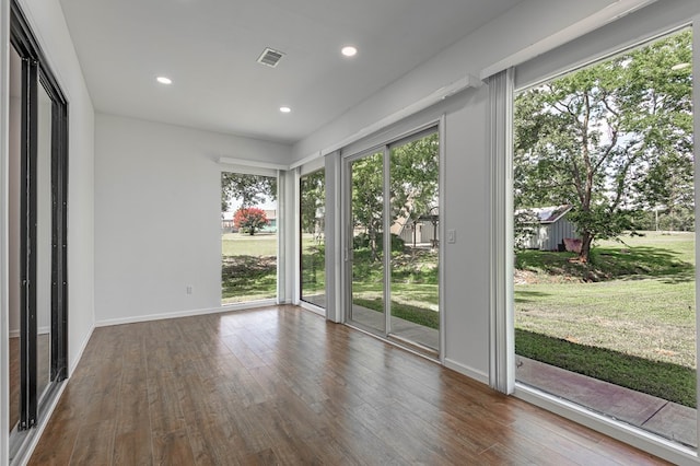 20 Coolcrest Dr, Point Blank, TX 77364 - unfurnished sunroom featuring plenty of natural light, recessed lighting, and wood finished floors