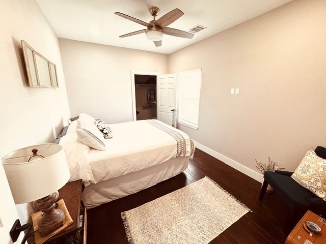 304 Lcr 485, Mexia, TX 76667 - bedroom with visible vents, baseboards, a closet, ceiling fan, and dark wood-style floors