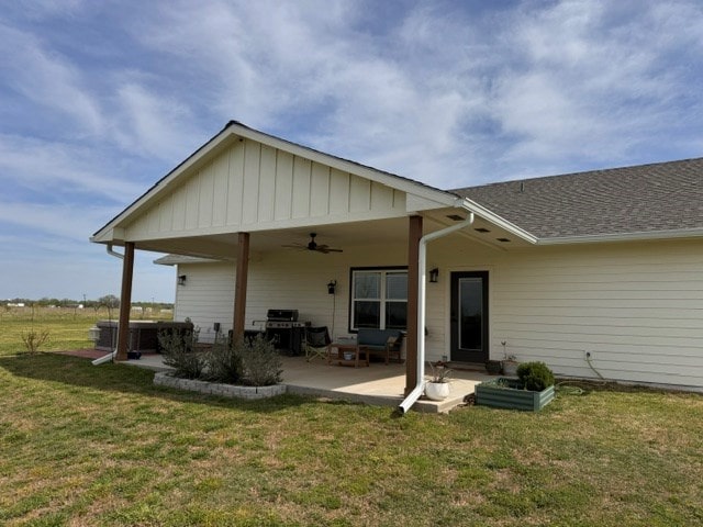 304 Lcr 485, Mexia, TX 76667 - back of property with a patio, a shingled roof, a lawn, and ceiling fan