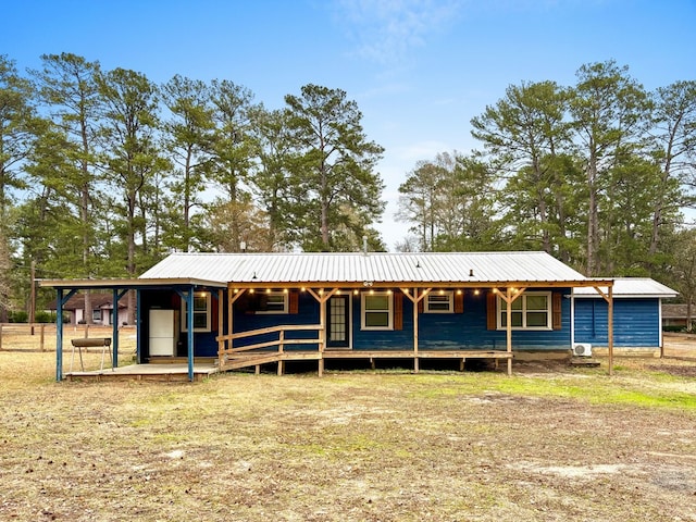 view of front of property with metal roof