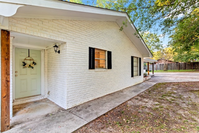 view of home's exterior with a patio area