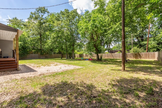 240 W 7th St, Trinity, TX 75862 - view of yard featuring a wooden deck