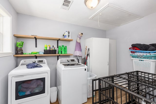 240 W 7th St, Trinity, TX 75862 - washroom with attic access and washer and dryer