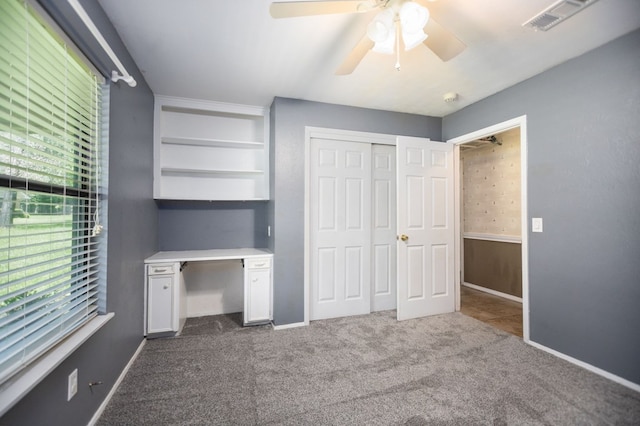 4 Pinemont Pl, Lufkin, TX 75904 - unfurnished office featuring ceiling fan, carpet flooring, and built in shelves