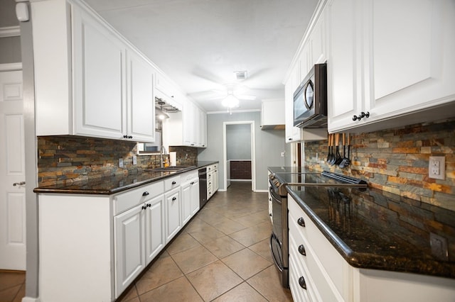 4 Pinemont Pl, Lufkin, TX 75904 - kitchen featuring electric range oven, stainless steel microwave, a ceiling fan, and tasteful backsplash