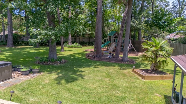 4 Pinemont Pl, Lufkin, TX 75904 - fenced backyard featuring a playground