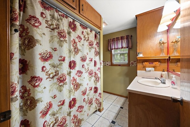 bathroom featuring tile patterned floors and vanity