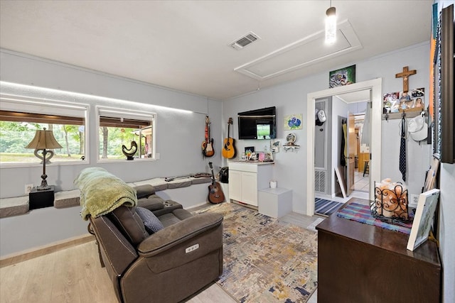 living room with light hardwood / wood-style floors