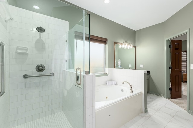 bathroom with vanity and independent shower and bath