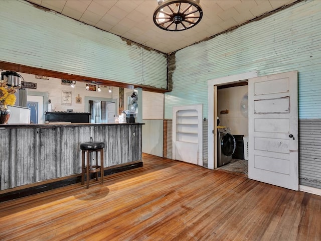 203 Chandler St, Diboll, TX 75941 - kitchen with washer / clothes dryer and wood-type flooring