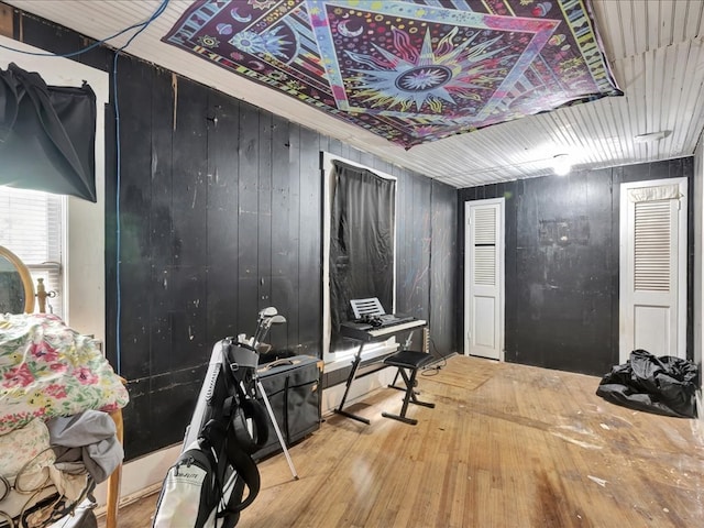 203 Chandler St, Diboll, TX 75941 - misc room featuring wooden walls and hardwood / wood-style flooring