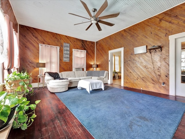 203 Chandler St, Diboll, TX 75941 - living area with wooden walls, ceiling fan, and wood finished floors