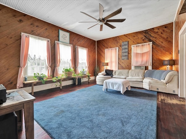 203 Chandler St, Diboll, TX 75941 - living room with wooden walls and a ceiling fan