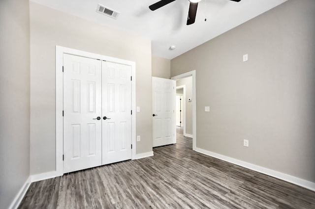 2510 Jimmie, Lufkin, TX 74904 - unfurnished bedroom with wood finished floors, a closet, baseboards, and a ceiling fan