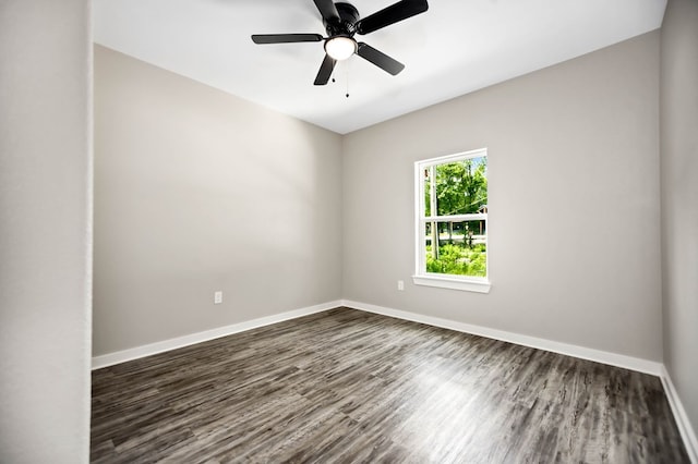 2510 Jimmie, Lufkin, TX 74904 - empty room featuring dark wood-style flooring, baseboards, and a ceiling fan