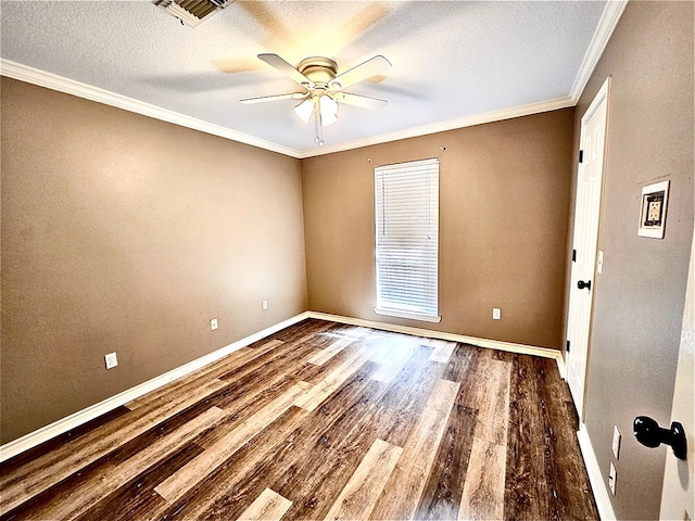 unfurnished room featuring ceiling fan, dark wood-type flooring, a textured ceiling, and ornamental molding