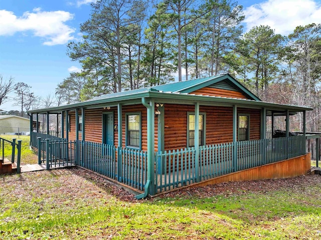 view of home's exterior featuring covered porch