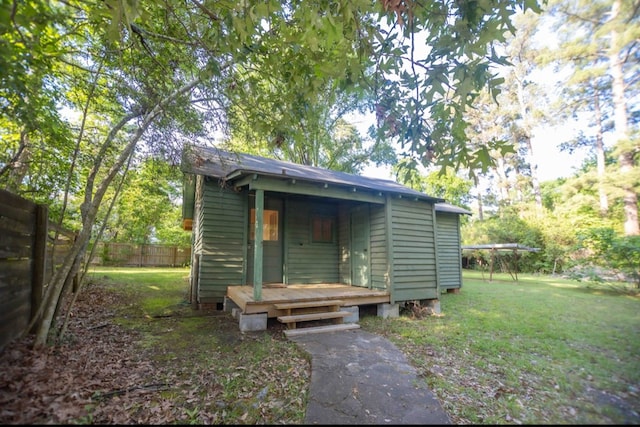 view of outdoor structure featuring fence