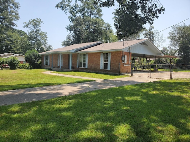 ranch-style house with a front lawn and a carport