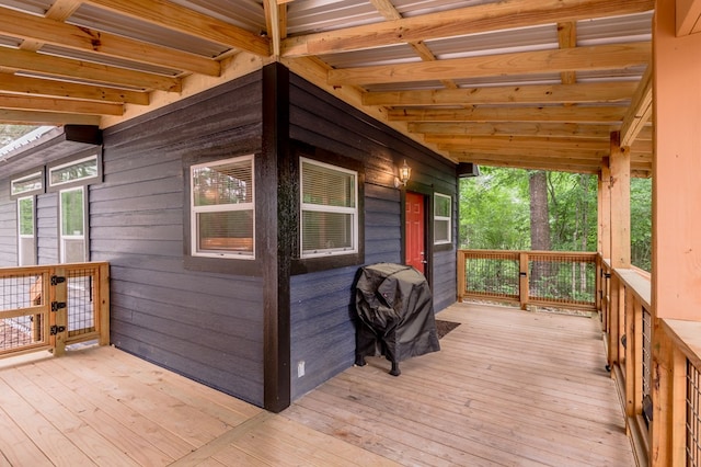deck featuring a grill