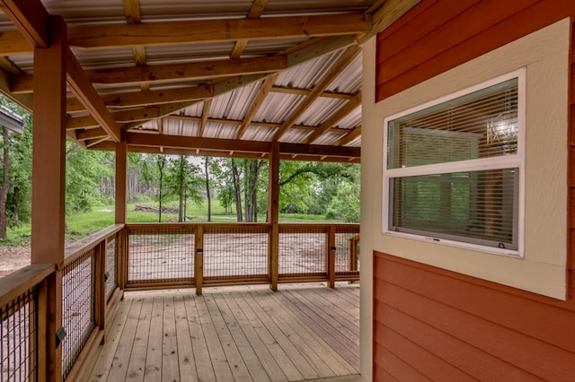 unfurnished sunroom with a healthy amount of sunlight