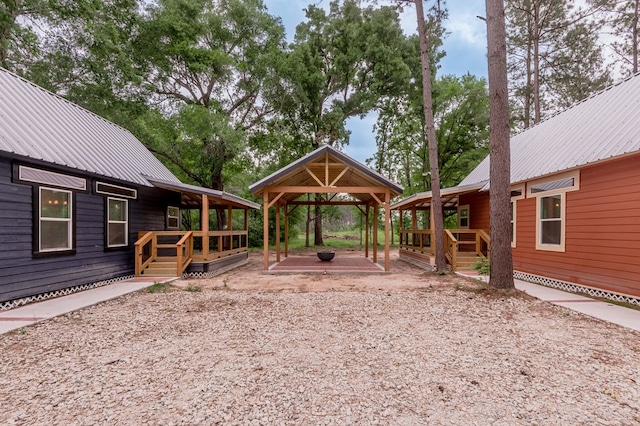 view of yard featuring a gazebo and a wooden deck