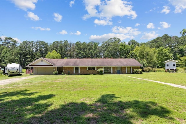 ranch-style house with a front yard