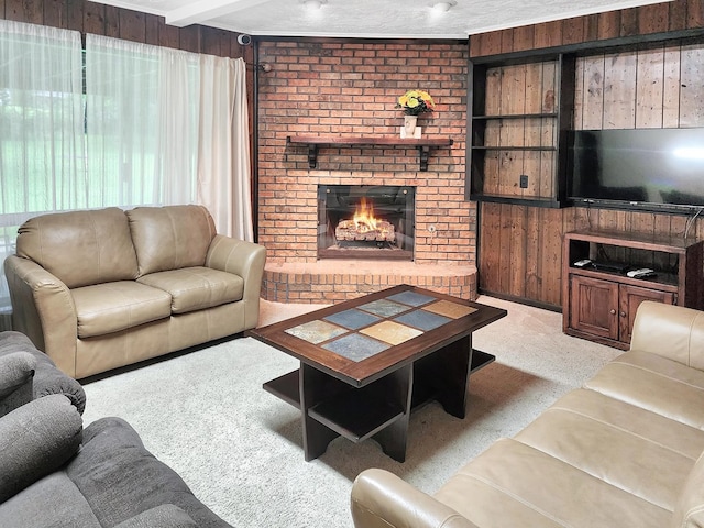 906 Richardson Dr, Jasper, TX 75951 - carpeted living area featuring a brick fireplace and wooden walls