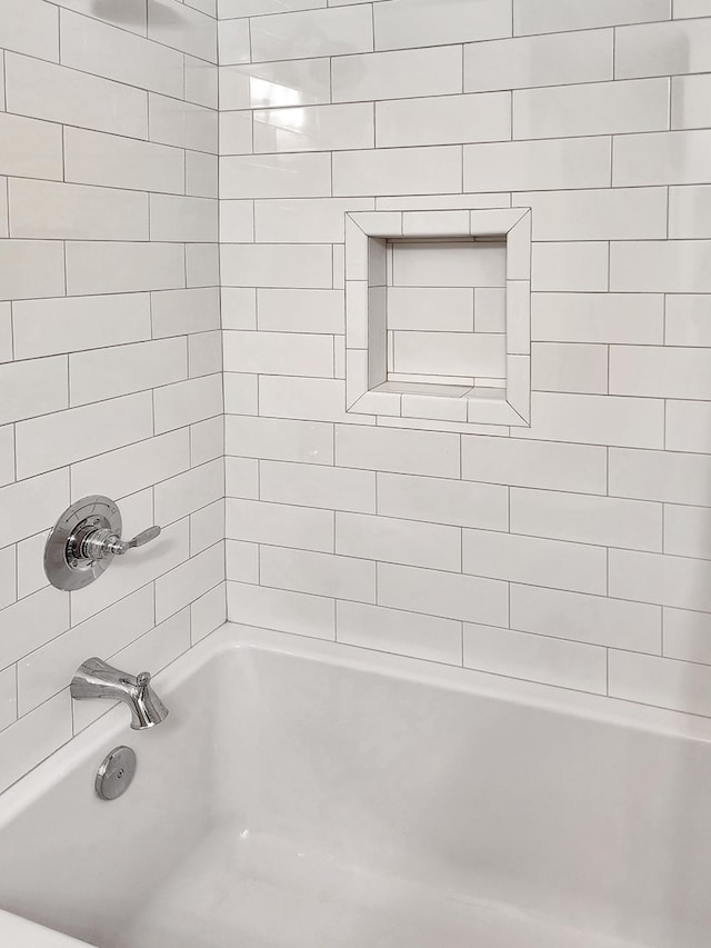 906 Richardson Dr, Jasper, TX 75951 - bathroom featuring shower / tub combination