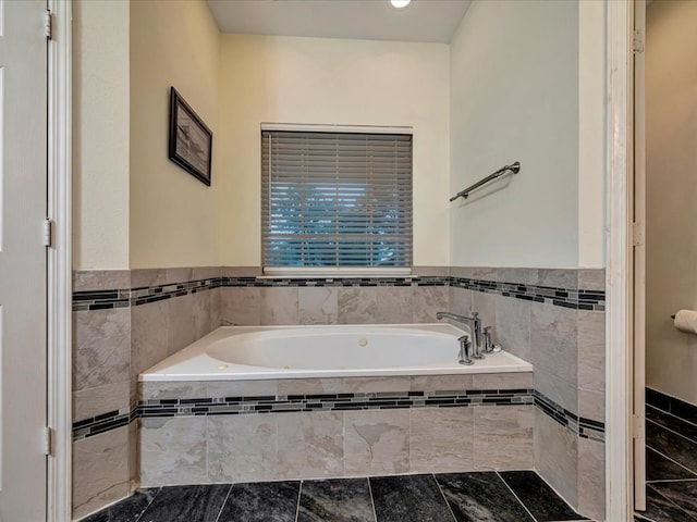 bathroom featuring tiled bath